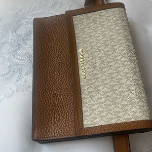 MK belt bag. New with tags. Brown and beige with monogram and gold writing(MK)